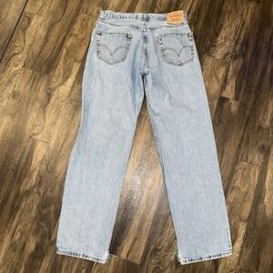 Vintage Levi's 550 Men's Relaxed Fit Light Wash Denim Jeans Size 34x34